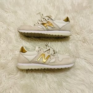 New Balance white suede & gold sneakers
